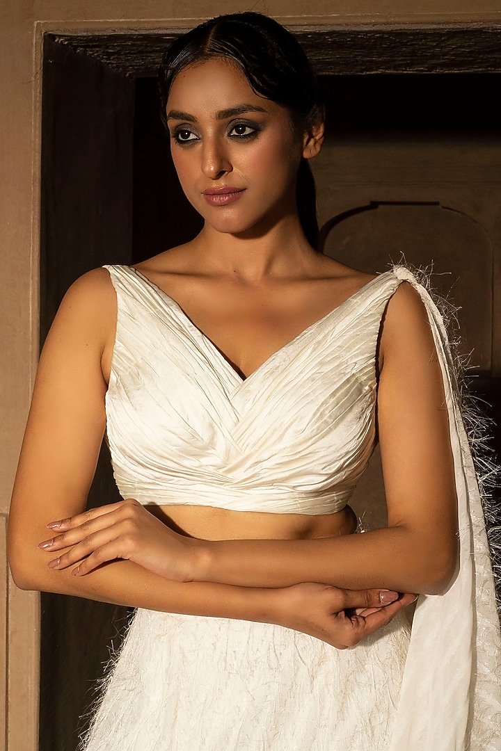 Ivory White Georgette Tiered Wedding Lehenga Set by Auruhfy at Pernia's Pop Up Shop