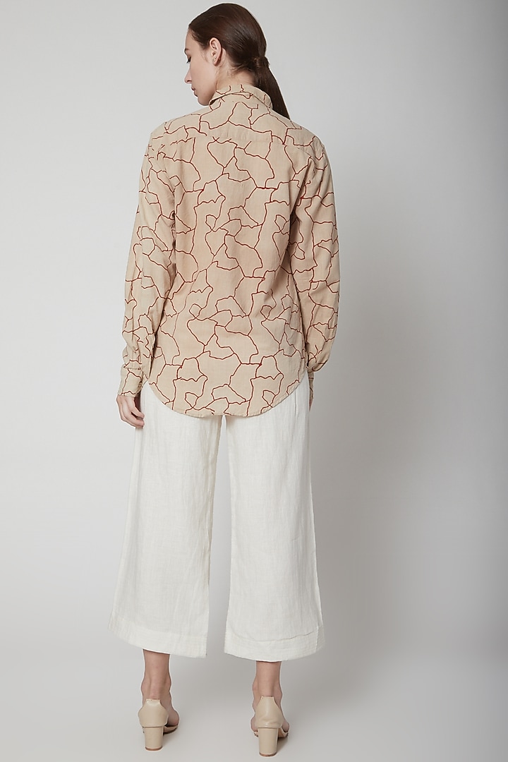 White Flared Pants With Pockets by AURUHFY at Pernia's Pop Up Shop
