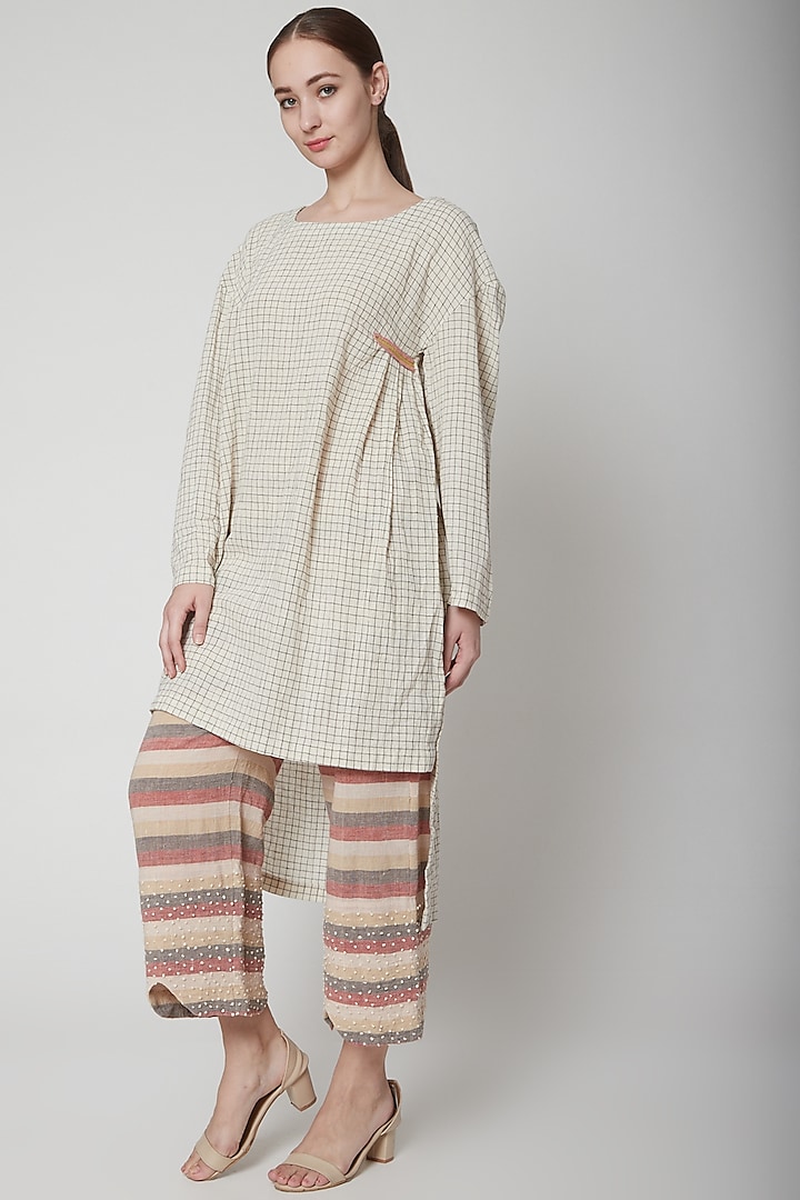 Off White Embroidered High-Low Tunic by AURUHFY