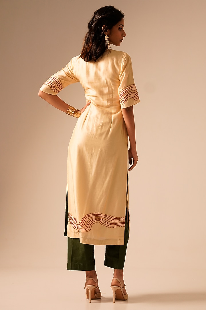 Cream Raw Silk Printed & Embroidered Kurta Set by Aravi at Pernia's Pop Up Shop