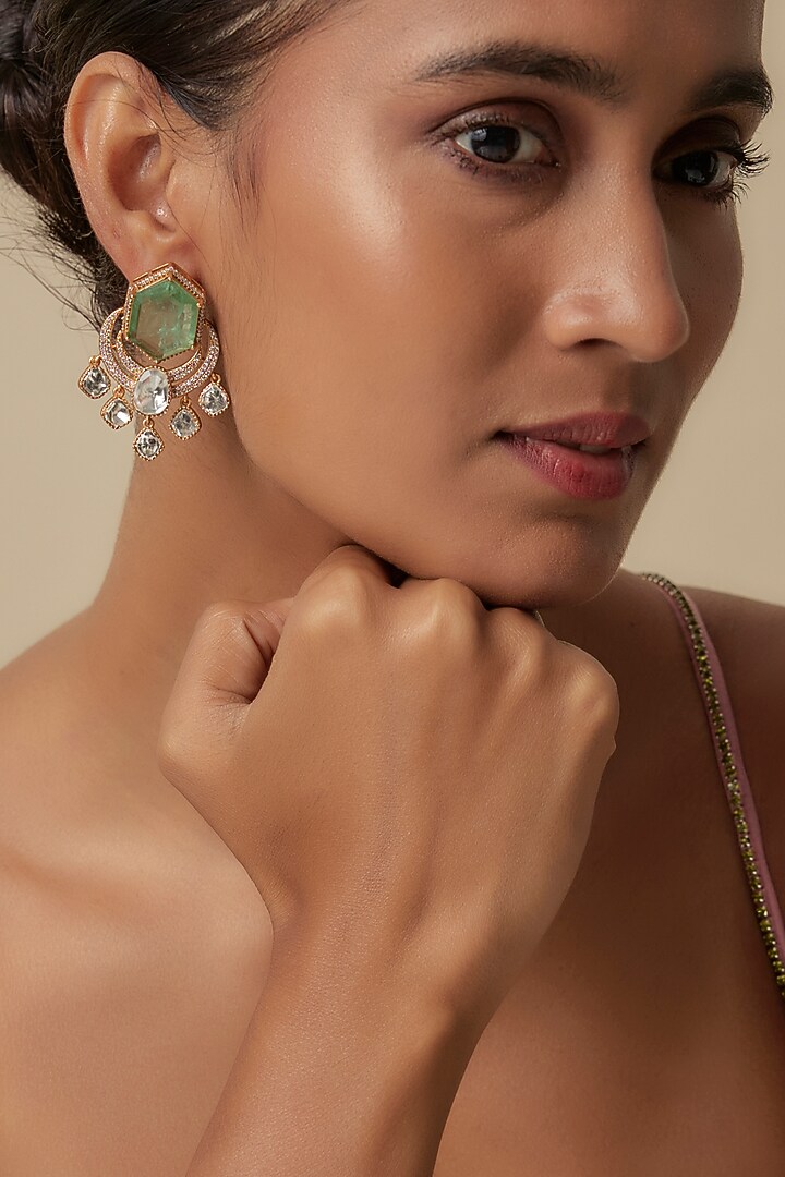 Gold Finish Uncut Zircon & Synthetic Emerald Dangler Earrings by Aryah Jewels at Pernia's Pop Up Shop