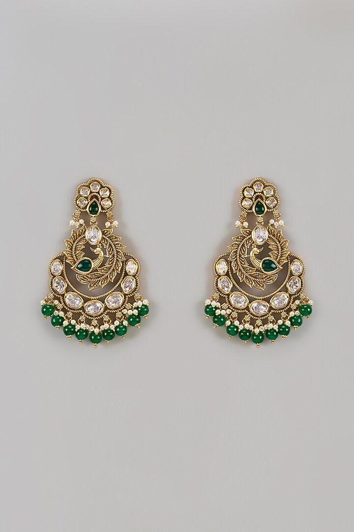 Gold Finish Uncut Zircon & Emerald Dangler Earrings by Aryah Jewels at Pernia's Pop Up Shop