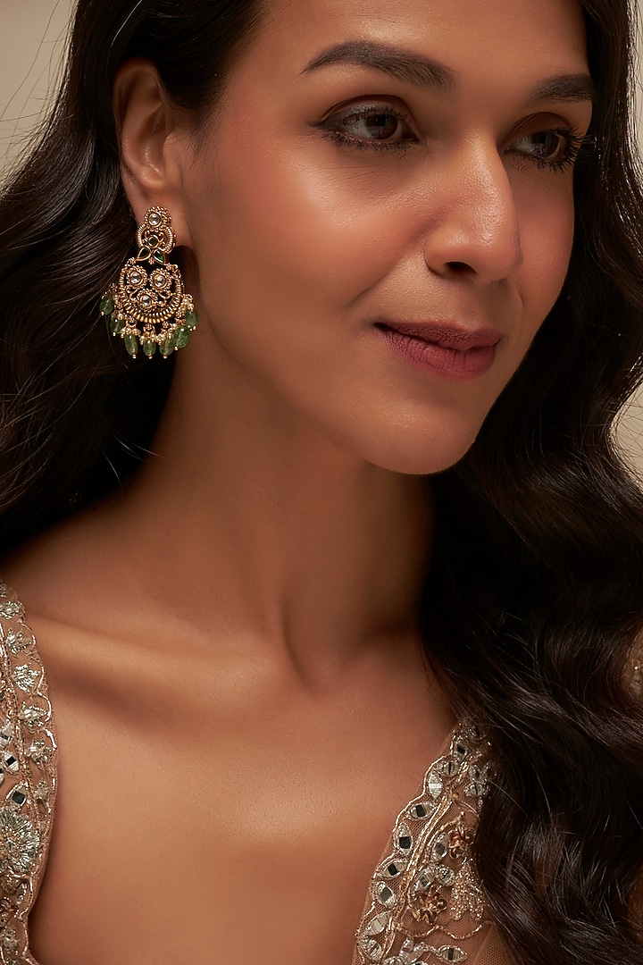 Gold Finish Uncut Zircon & Emerald Beaded Dangler Earrings by Aryah Jewels at Pernia's Pop Up Shop