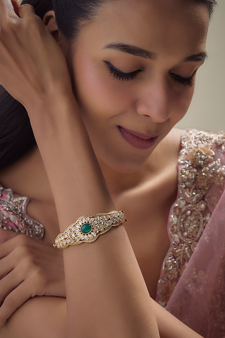 Gold Finish Emerald Stone & Kundan Polki Bracelet by Aryah Jewels at Pernia's Pop Up Shop