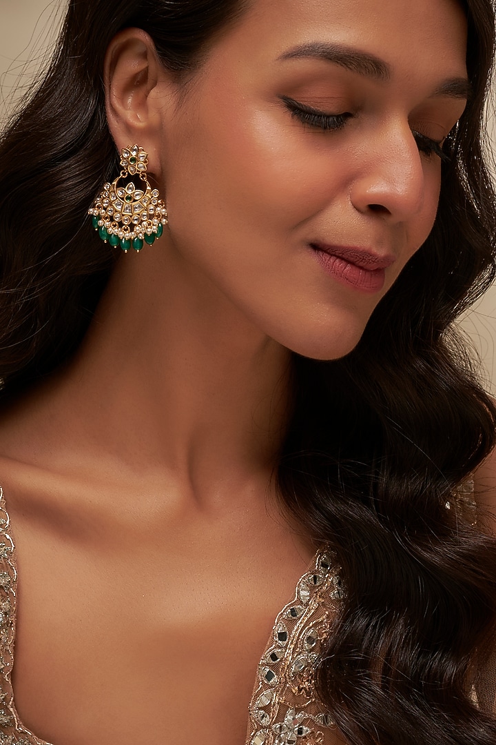 Gold Finish Uncut Zircon & Emerald Beaded Dangler Earrings by Aryah Jewels at Pernia's Pop Up Shop