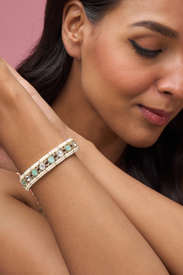 Gold Finish Aqua Blue Stone Beaded Bracelet by Aryah Jewels at Pernia's Pop Up Shop