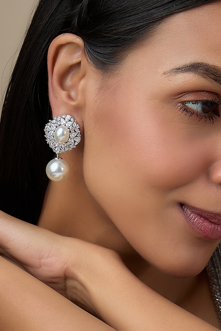 White Finish Diamond & Pearl Dangler Earrings by Aryah Jewels