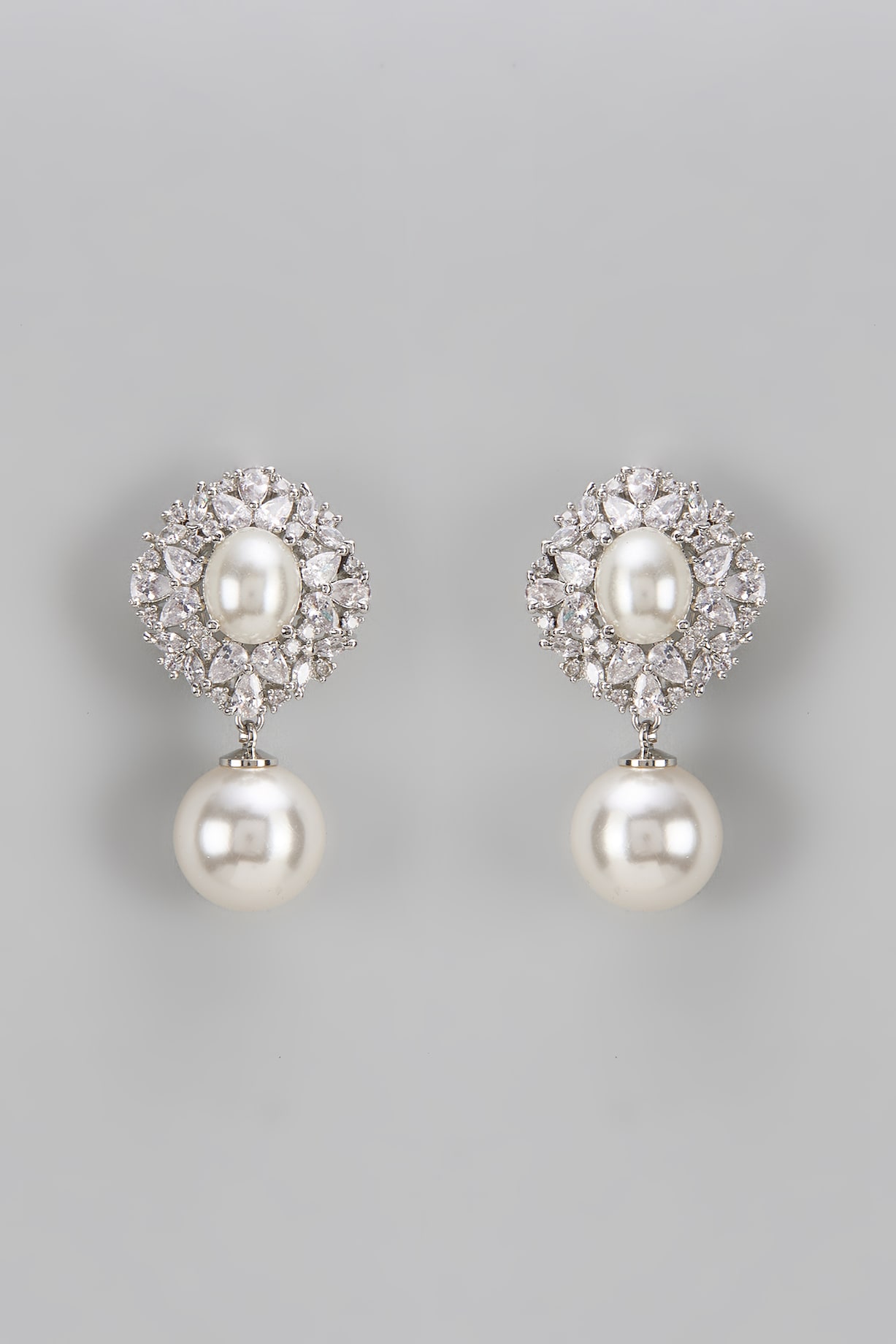 White Finish Diamond Pearl Dangler Earrings by Aryah Jewels at Pernia's  Pop Up Shop