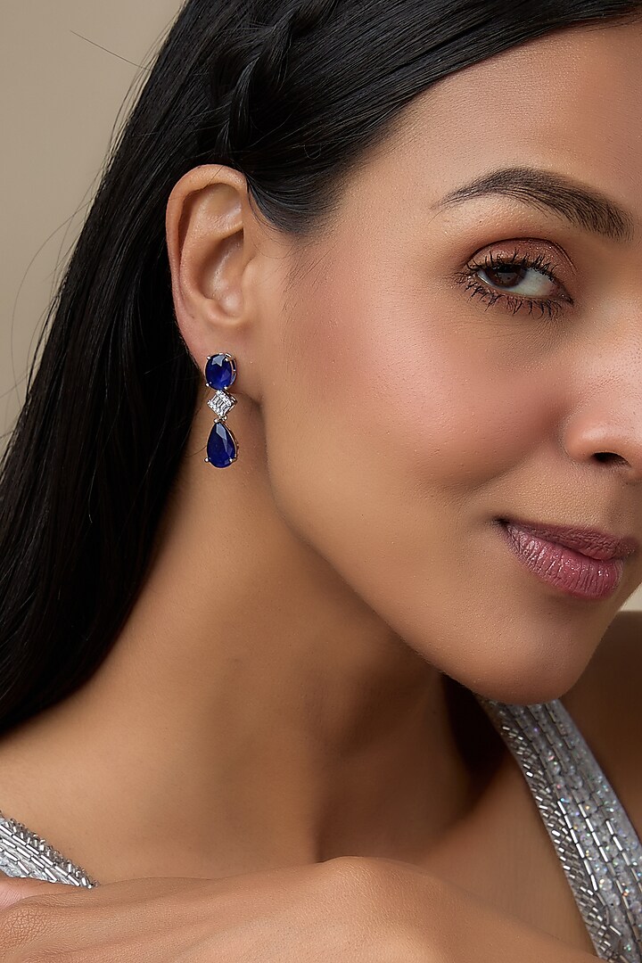 White Finish Diamond & Emerald Stone Dangler Earrings by Aryah Jewels