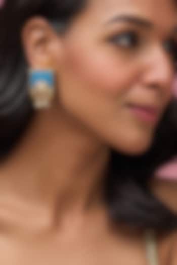 Gold Finish Synthetic Blue Stone Temple Stud Earrings by Aryah Jewels