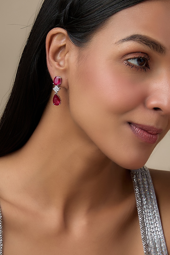 White Finish Diamond & Red Stone Dangler Earrings by Aryah Jewels