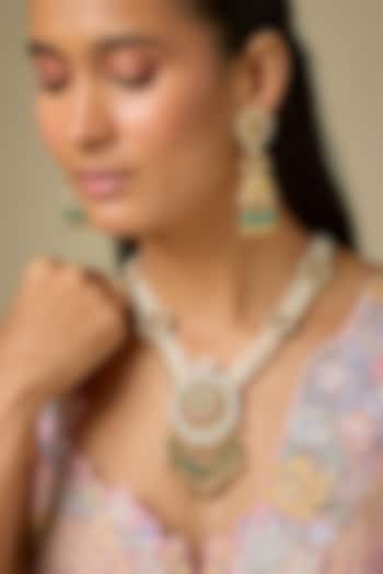 Gold Finish Pearl & Emerald Beaded Long Pendant Necklace Set by Aryah Jewels at Pernia's Pop Up Shop