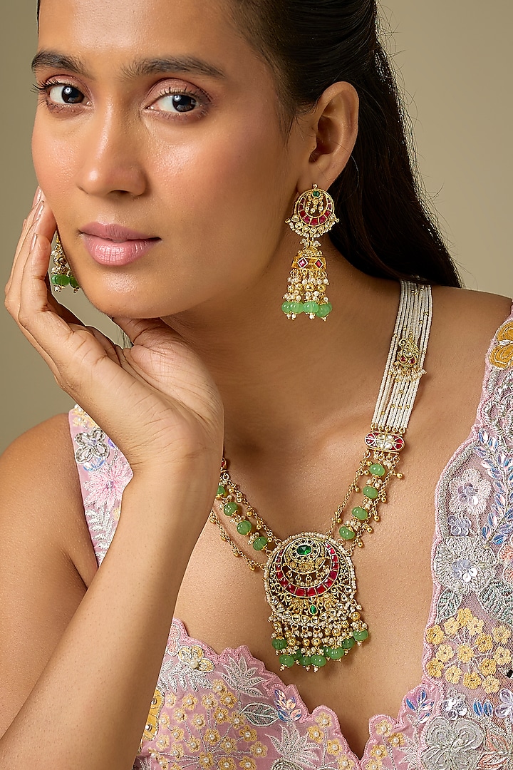 Gold Finish Pearl & Emerald Beaded Long Pendant Necklace Set by Aryah Jewels at Pernia's Pop Up Shop