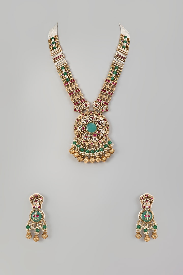 Gold Finish Emerald Stone & Uncut Zircon Pendant Necklace Set by Aryah Jewels at Pernia's Pop Up Shop