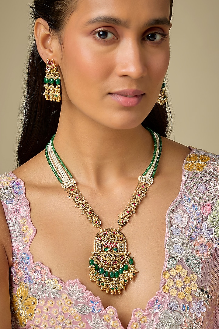 Gold Finish Emerald Stone & Uncut Zircon Pendant Necklace Set by Aryah Jewels at Pernia's Pop Up Shop