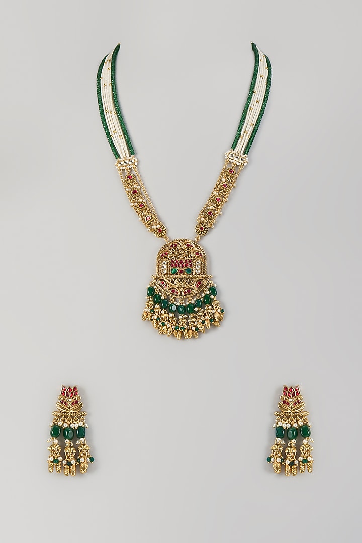 Gold Finish Emerald Stone & Uncut Zircon Pendant Necklace Set by Aryah Jewels at Pernia's Pop Up Shop