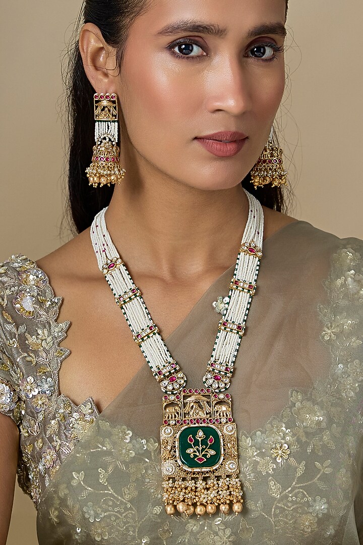 Gold Finish Emerald Stone & Uncut Zircon Long Pendant Necklace Set by Aryah Jewels at Pernia's Pop Up Shop