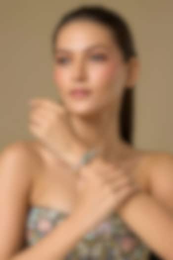 Two Tone Finish Swarovski Zircon & Emerald Bracelet In Sterling Silver by Aryah Jewels at Pernia's Pop Up Shop