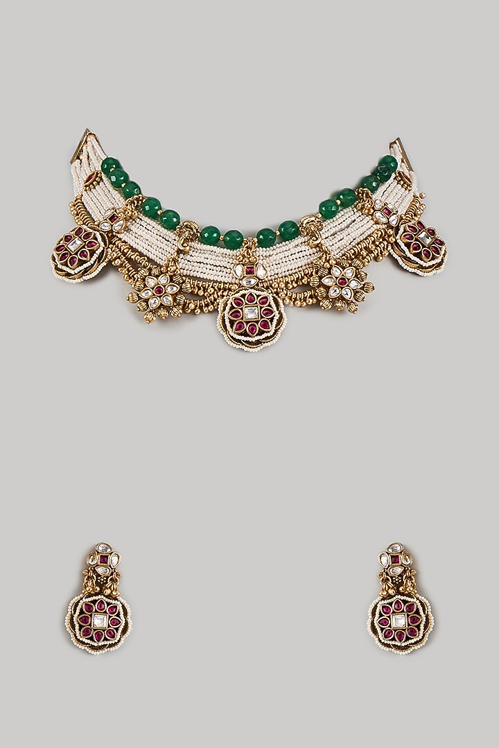 Gold Finish Uncut Zircon & Green Beaded Temple Choker Necklace Set by Aryah Jewels at Pernia's Pop Up Shop
