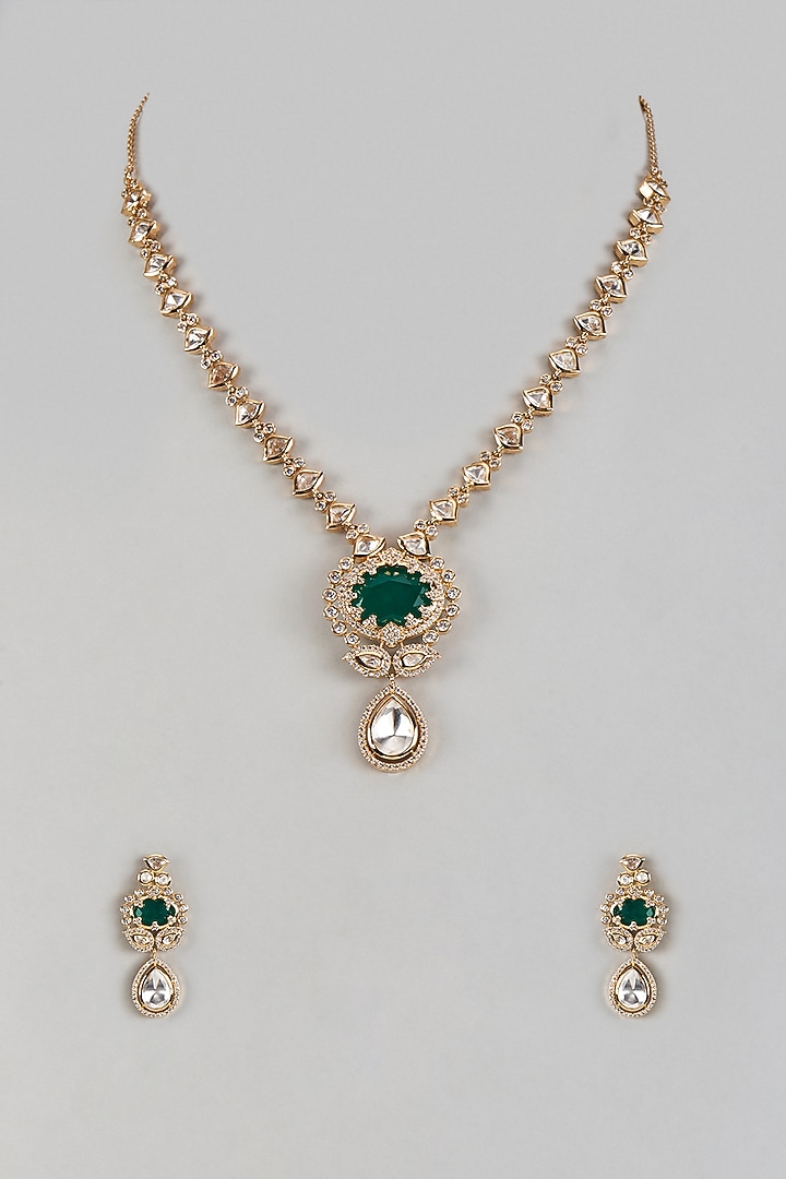 Gold Finish Uncut Zircon & Synthetic Emerald Stone Pendant Necklace Set by Aryah Jewels at Pernia's Pop Up Shop