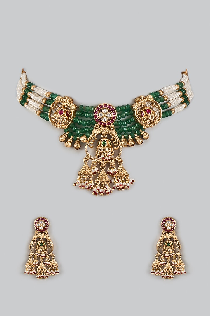 Gold Finish Uncut Zircon & Red Semi-Precious Stone Choker Necklace Set by Aryah Jewels at Pernia's Pop Up Shop
