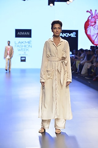 Peach patch pockets and cloverleaf collared long shirt by Aiman
