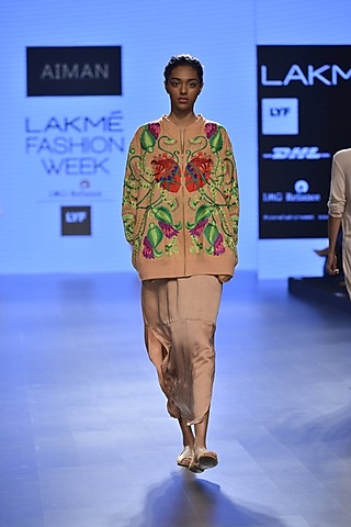 Tan trapped heart with venus fly trap motif embroidered bomber jacket by Aiman