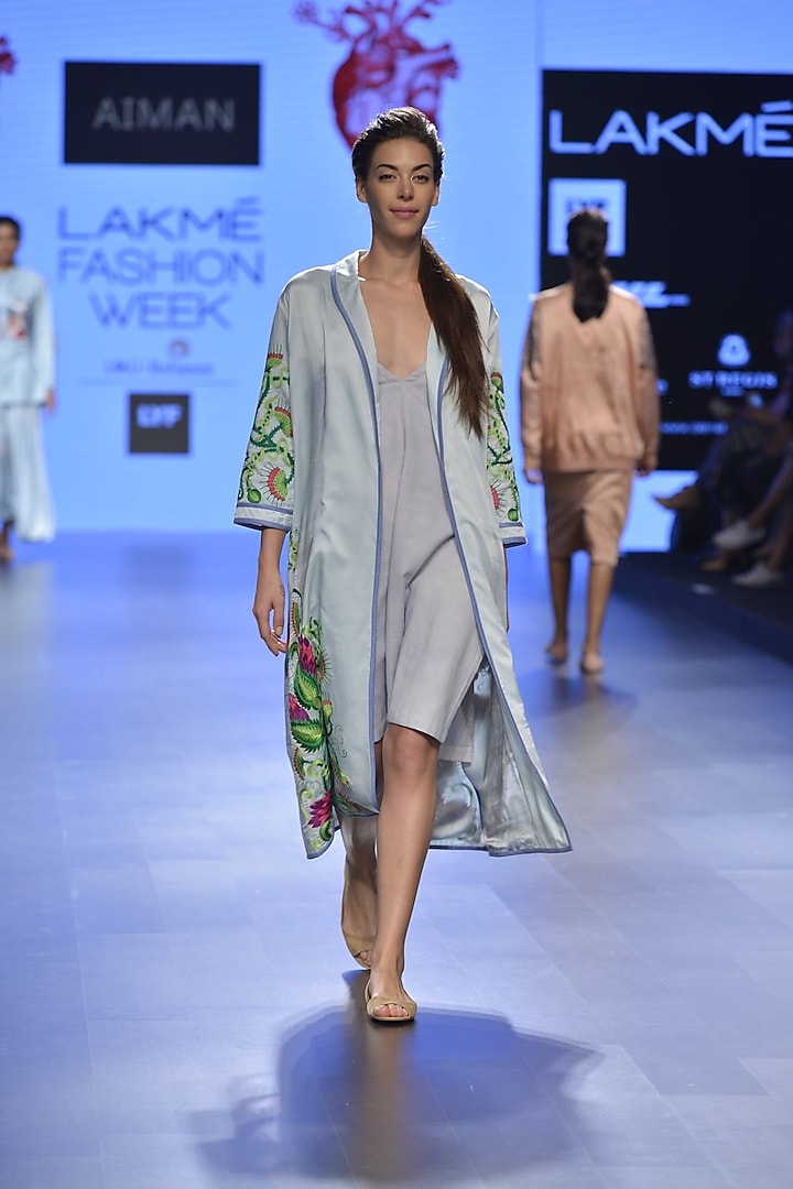 Dull ink blue embroidered trench coat by Aiman