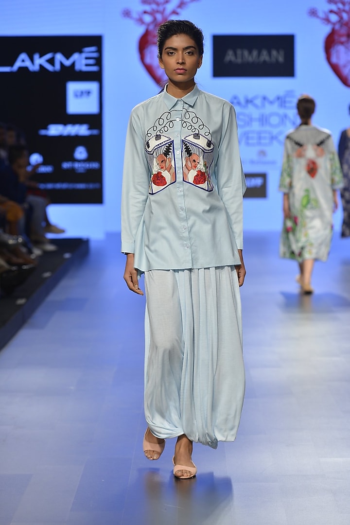 Powder blue battery embroidered motif button down shirt by Aiman