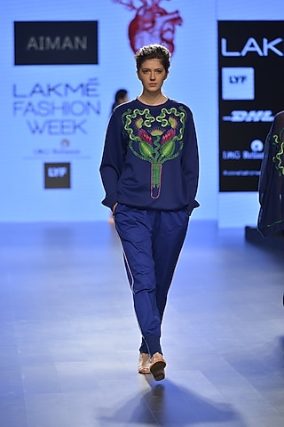 Navy blu test tube embroidered motif bomber jacket by Aiman
