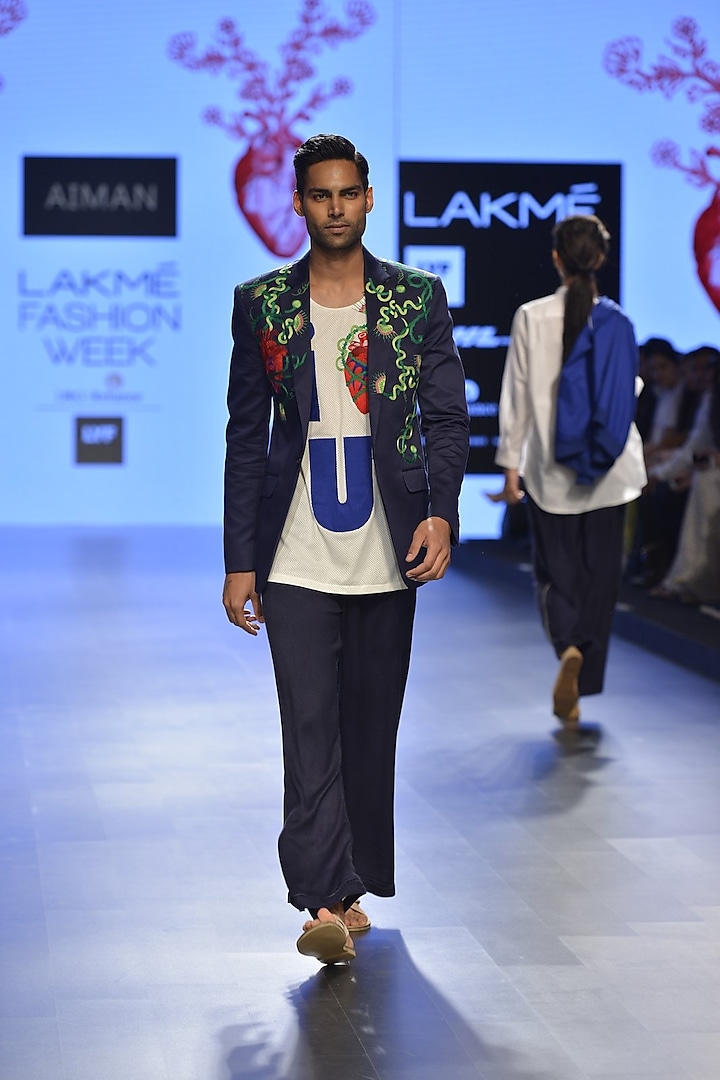 Deep navy floral embroidered coat by Aiman