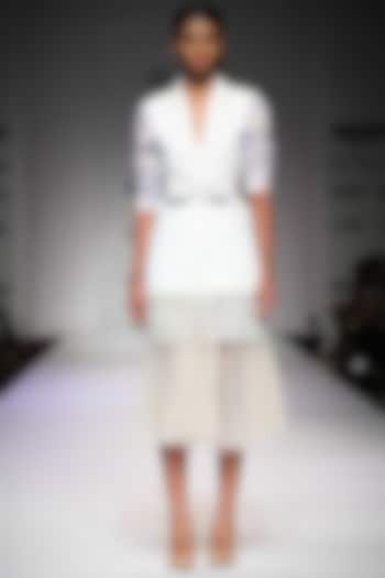 Off white printed pleated tulle skirt  by Archana Rao