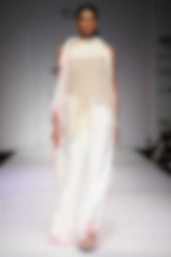 Off white and pink striped knit sari available only at Pernia's Pop Up Shop.
