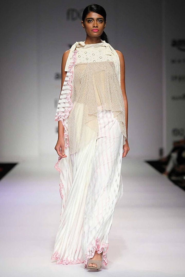 Off white and pink striped knit sari available only at Pernia's Pop Up Shop.