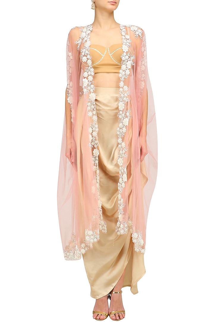 Baby pink floral embroidered cape and gold drape skirt set available only at Pernia's Pop Up Shop.