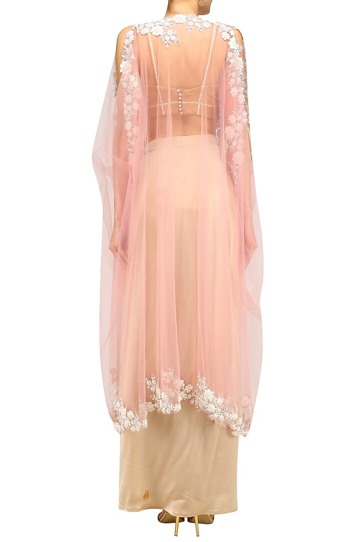 Baby pink floral embroidered cape and gold drape skirt set available only at Pernia's Pop Up Shop.