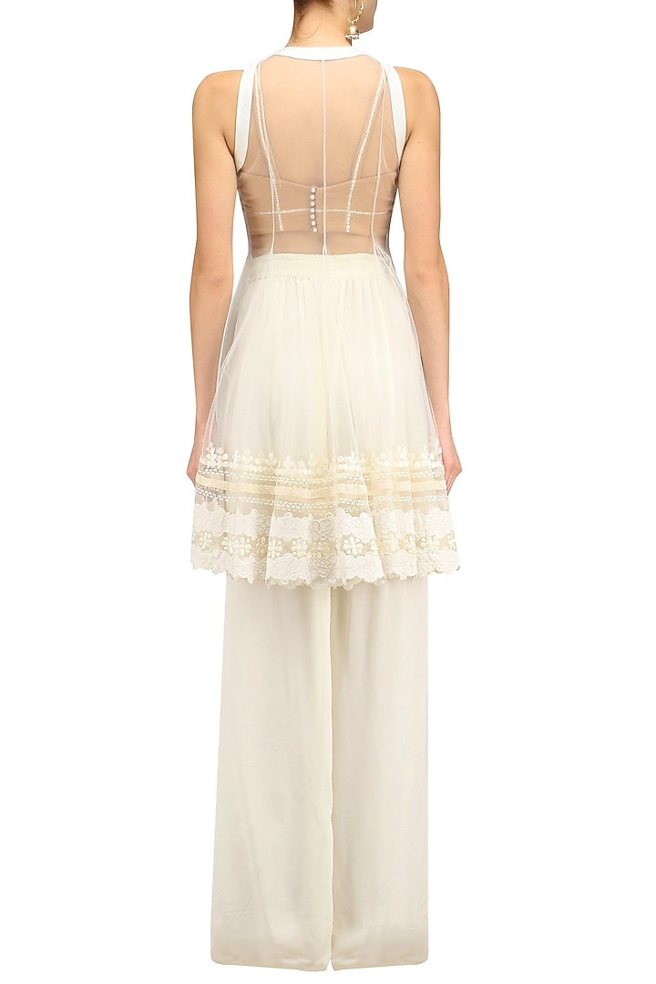 White lace embroidered jacket and palazzo pants set available only at Pernia's Pop Up Shop.