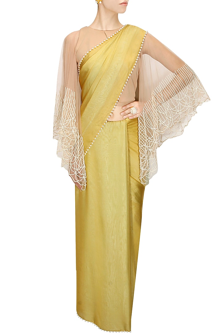 Mustard and mint blue two way sari with nude blouse available only at Pernia's Pop-Up Shop.