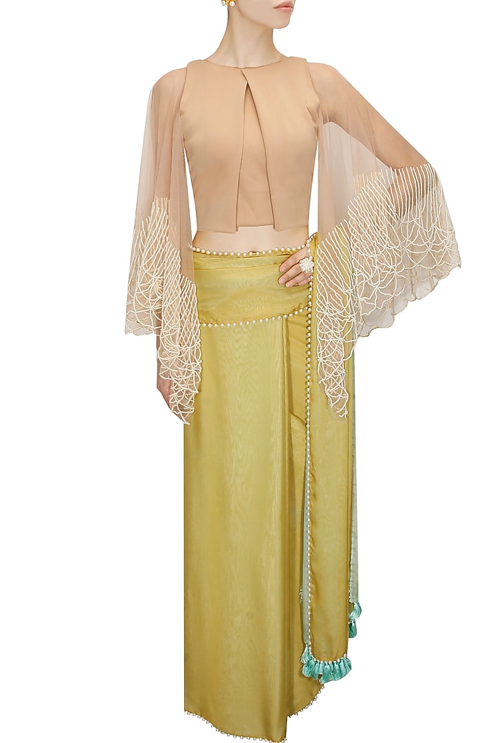 Mustard and mint blue two way sari with nude blouse available only at Pernia's Pop-Up Shop.