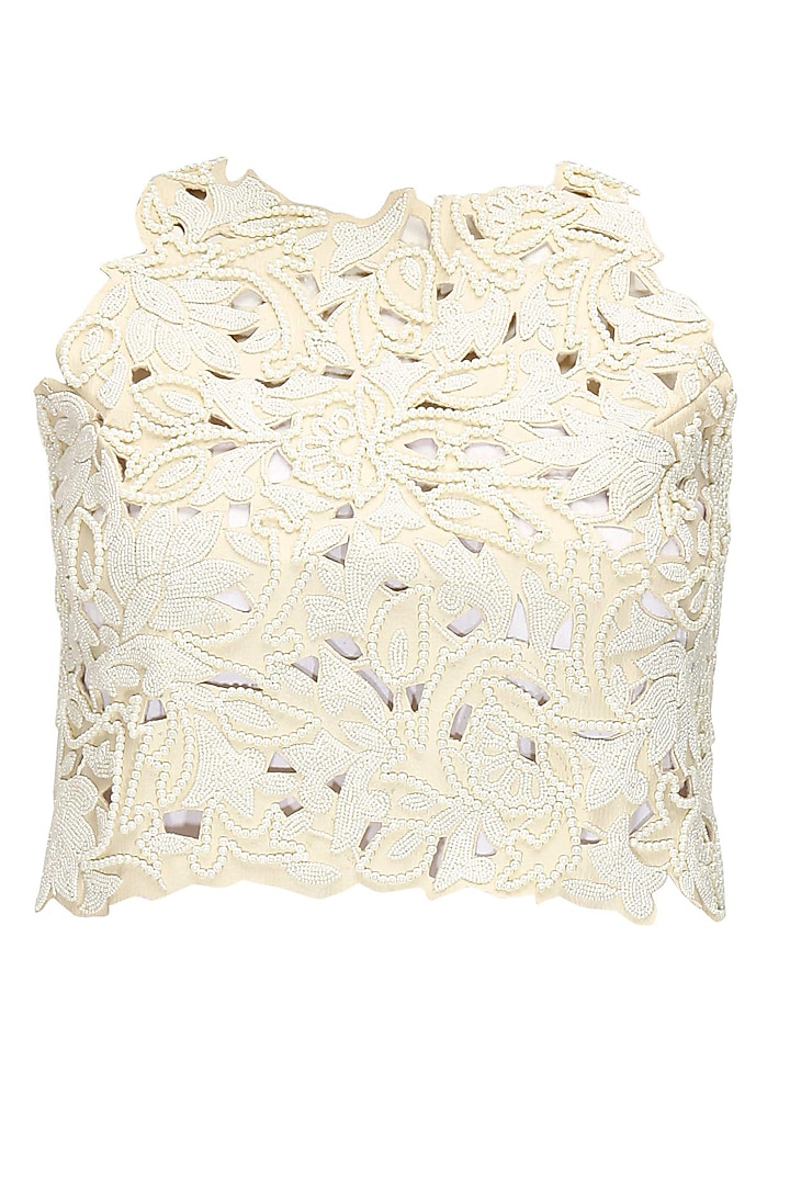 Off-white leather cutwork blouse available only at Pernia's Pop-Up Shop.