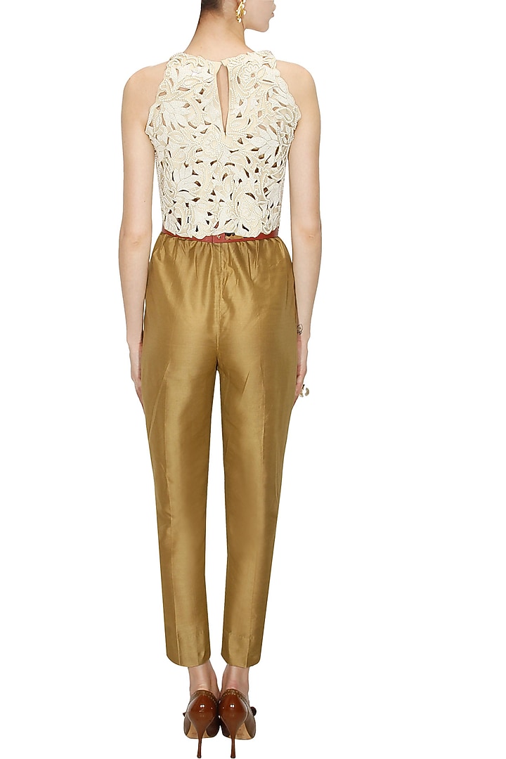Off-white leather cutwork blouse available only at Pernia's Pop-Up Shop.