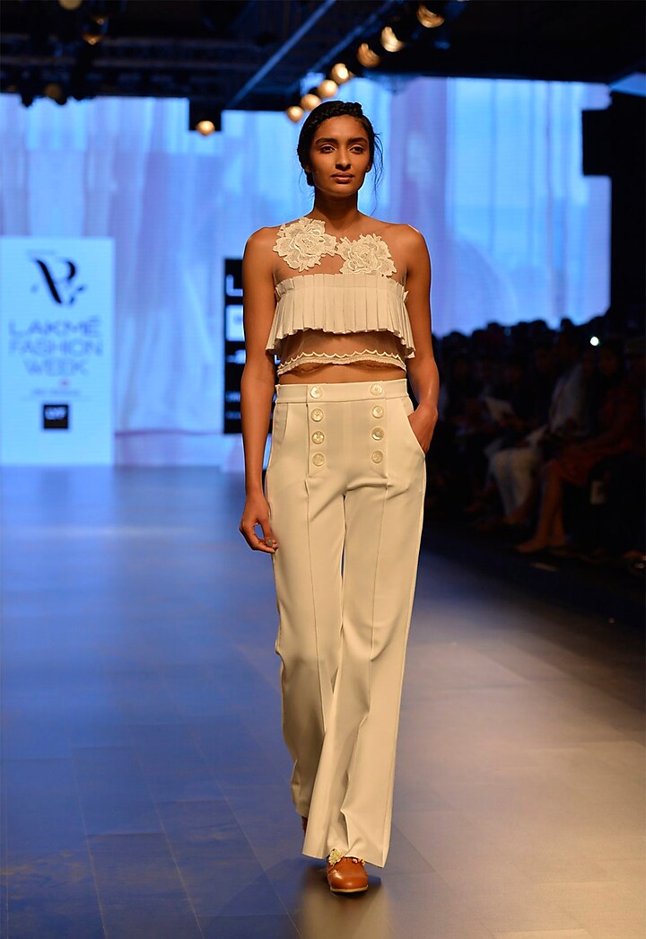 White lace appliqued ruffle crop top by Archana Rao
