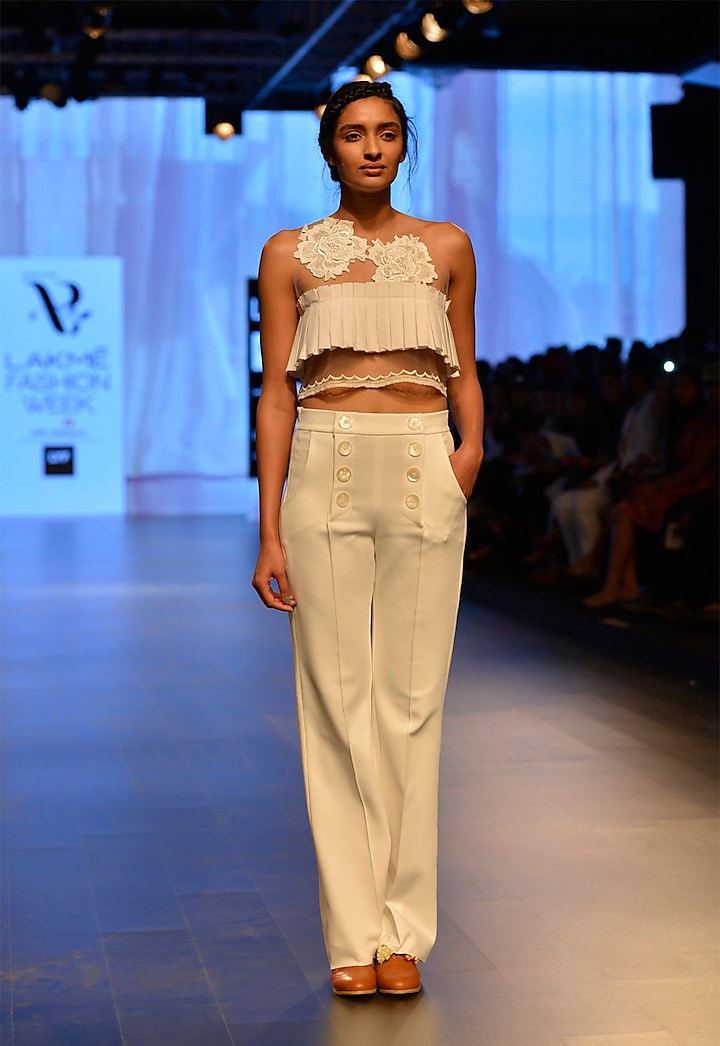 White neoprene high waisted trousers by Archana Rao