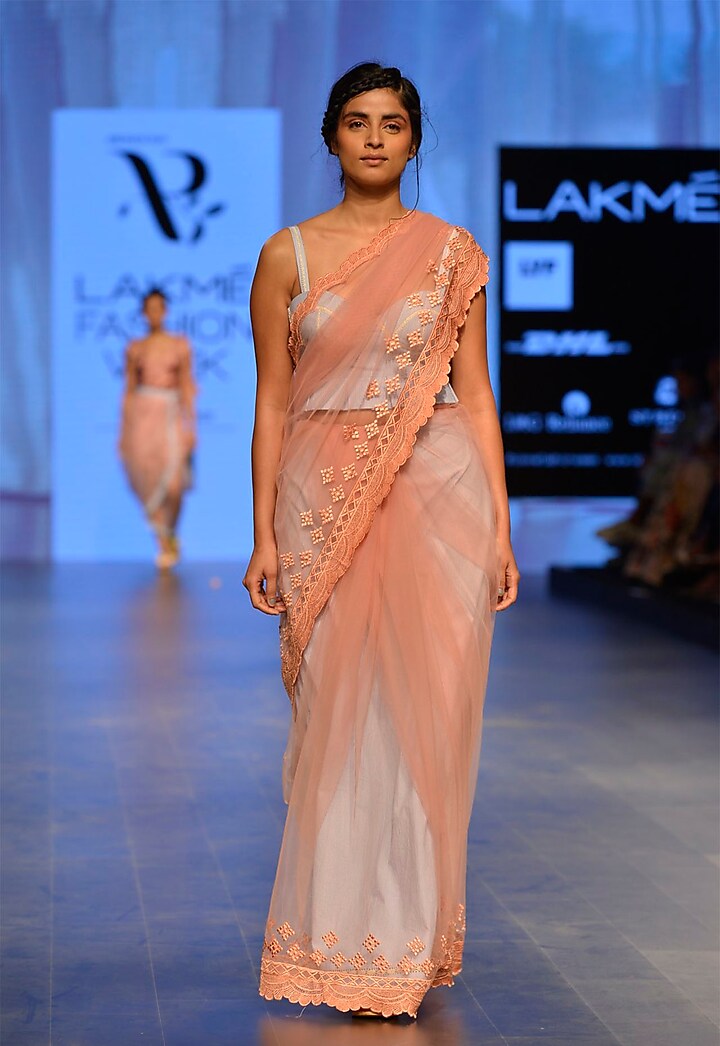 Peach pink embroidered saree by Archana Rao