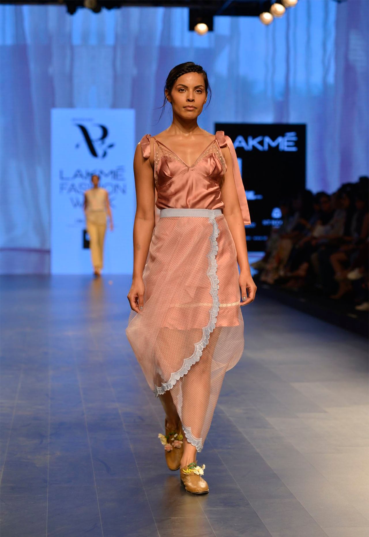 Pink polka dot organza wrap skirt available only at Pernia's Pop