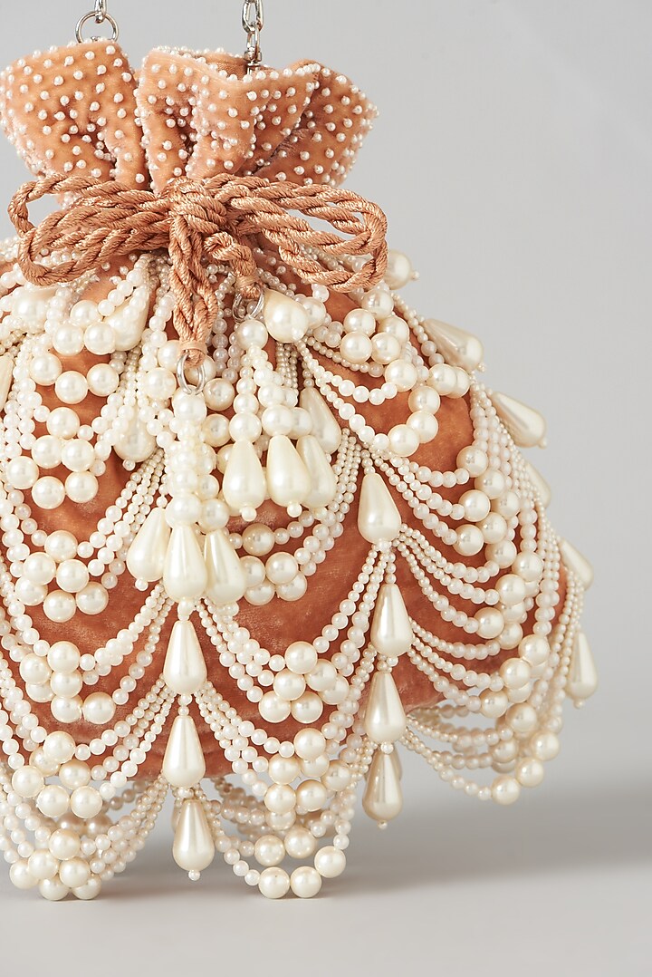 Pink Velvet Embroidered Oyster Potli Bag by Aanchal Sayal at Pernia's Pop Up Shop