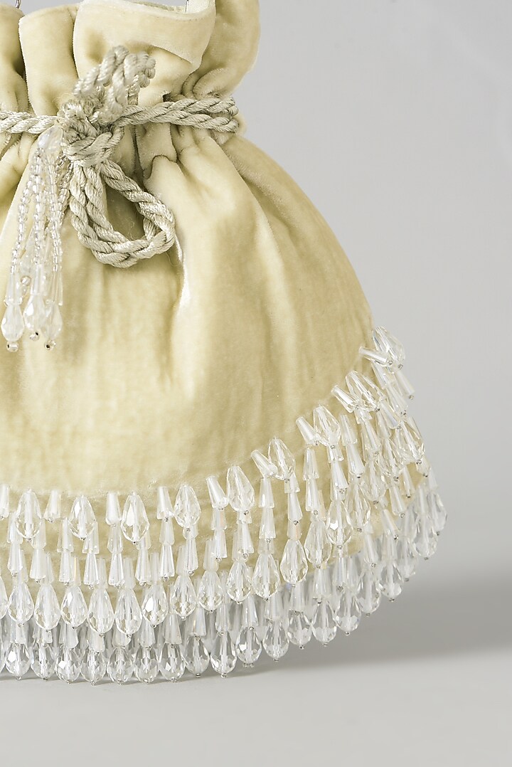 Beige Velvet Embroidered Oyster Potli Bag by Aanchal Sayal at Pernia's Pop Up Shop
