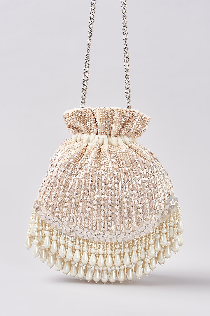 Ivory Velvet Sequins Embroidered Potli by Aanchal Sayal at Pernia's Pop Up Shop