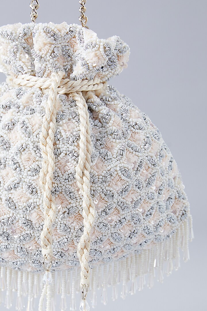 Beige Velvet Pearl Embroidered Potli by Aanchal Sayal at Pernia's Pop Up Shop