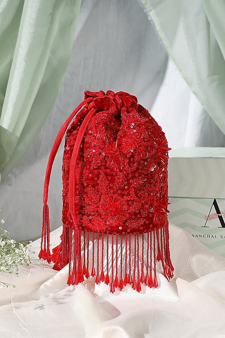 Red Sequins Embellished Bucket Bag by Aanchal Sayal at Pernia's Pop Up Shop